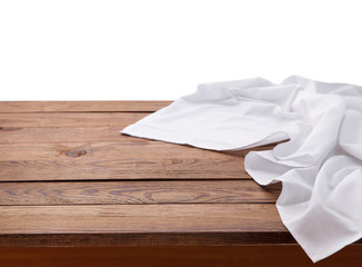 Kitchen towel on empty wooden table. Napkin close up top view mock up for design. Kitchen rustic...