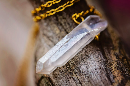 Natural crystal quartz pendant on metal chain