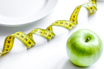 concept diet and weight loss on white background top view