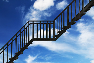 black steel stairs with blue sky