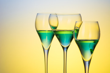 three glasses with cocktails