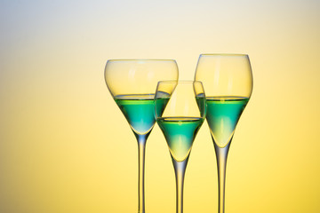 three glasses with cocktails