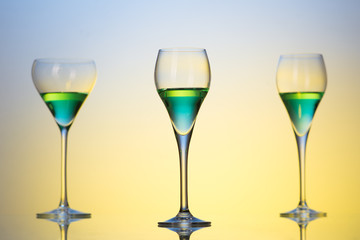three glasses with cocktails