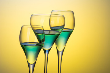 three glasses with cocktails