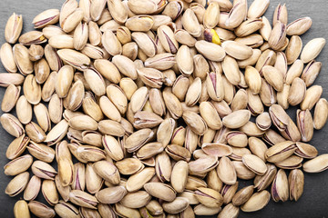 many pistachios are scattered