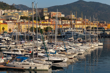 Fototapeta na wymiar Ajaccio port in morning sunlight. Corsica