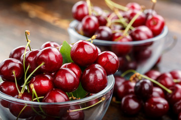 sweet cherries in a glass plate