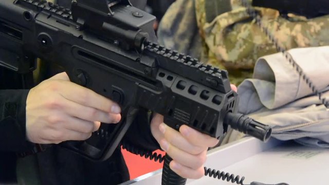 Several large-caliber weapons on the table close-up