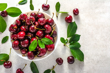 Fresh cherries. Red sweet cherry fruit with leaves