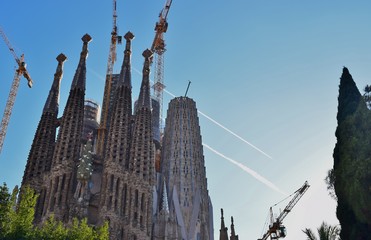 Gothic temple with high towers and different facades.