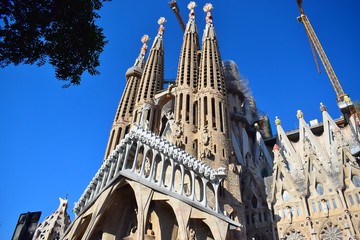 Gothic temple with high towers and different facades.