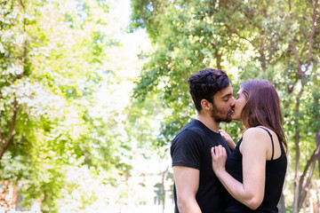 Fototapeta premium Young couple in love enjoy a sunny day in the park 