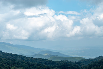 The beauty of the sky When light hits the clouds and mountain.