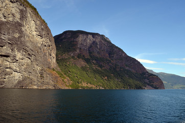 Fototapeta premium Mountains and fjord. Norwegian nature. Sognefjord. Flam, Norway 