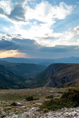 Fototapeta na wymiar panoramic view of green valley with stones in Durmitor massif, Montenegro