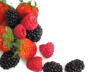Fresh strawberry, raspberry and blackberry on wooden background, healthy food and diet.