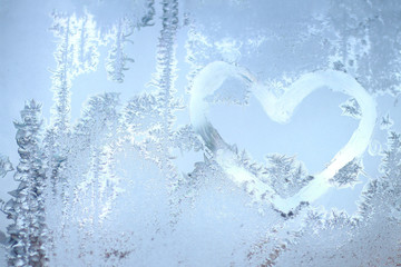 heart of frost heart on window. winter miracle
