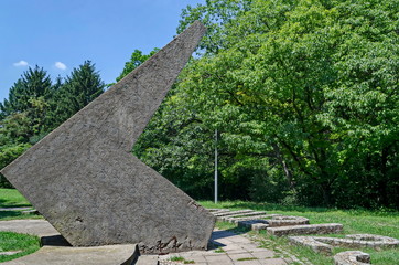 Fototapeta premium Fragment of abandoned Sun clock dial in the old North park with shadow point hour , Sofia, Bulgaria 