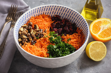 Carrot slaw with cranberries, walnuts and citrus dressing.