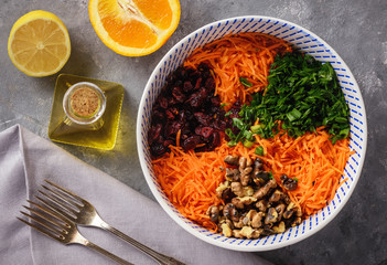 Carrot slaw with cranberries, walnuts and citrus dressing.