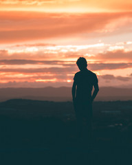 Fototapeta premium Human Silhouette in front of Sunset
