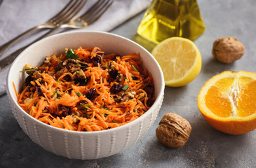 Carrot slaw with cranberries, walnuts and citrus dressing.