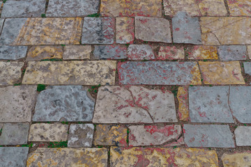 Background texture, limestone, basalt, cobblestone, granite, pebble. The laid out cobblestones used to lay the road