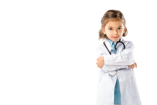 Portrait Of Kid Dressed In Doctors White Coat With Stethoscope Isolated On White