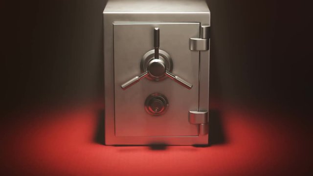 Opening of safe vault doors. Many antique, gold coins falling on red carpet.