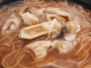 Top view and close up of brown color vermicelli with pork intestine.Traditional Taiwan food at...