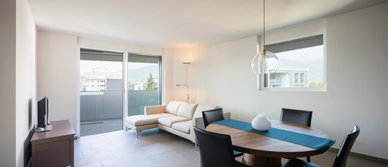 Living in modern apartment with design sofa. Nobody inside
