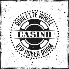 Casino round badge or emblem on grunge background