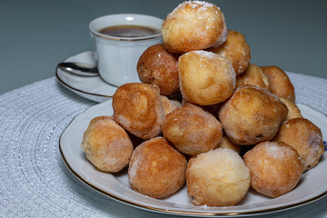 Bowl of mixed fritters with cup of coffee, Spain