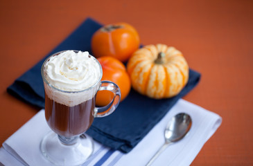 Pumpkin spiced coffee with whipped cream