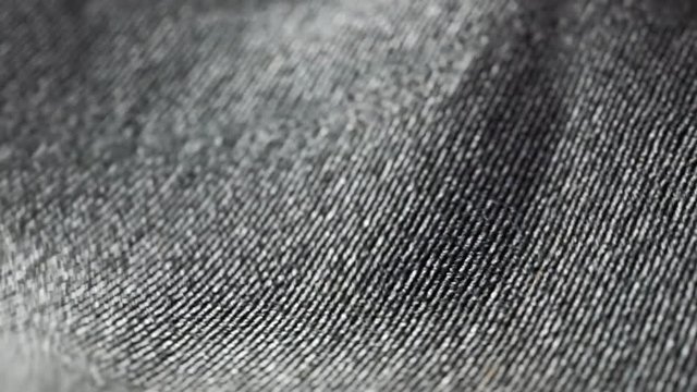 Highly detailed grey cloth fabric fluttering on the wind. Loopable animation 4K