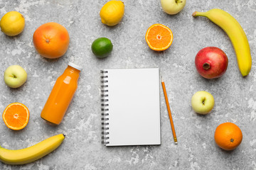 Healthy Food. Freah fruits and blank notebook with pencil