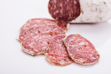 Saucisson sec delicious french salami on a white background
