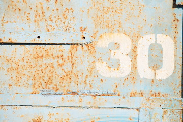 industrial background, texture of old painted metal with number 30
