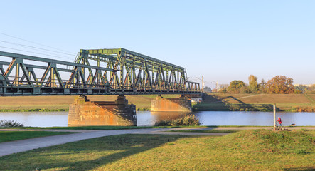 The railway bridge over Odra River in Opole - near of Odra River Park - obrazy, fototapety, plakaty