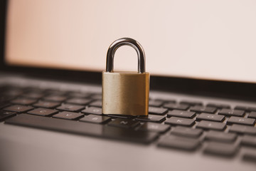 Padlock and Chain on a Laptop