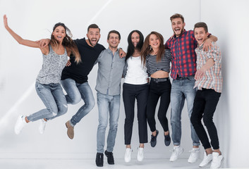Obraz premium triumphant group of young people