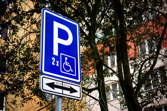 Traffic sign used to reserve wide parking spots for disabled persons