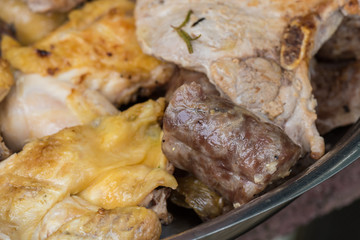 Cooked tasty mixed grilled meat