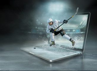 Naklejka premium Caucasian ice hockey Players in dynamic action in a professional