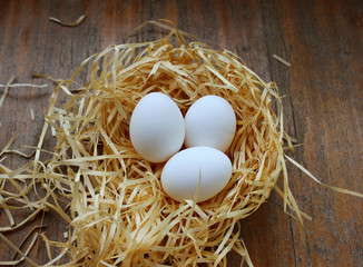 Three white eggs