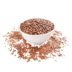 Flax seeds in bowl with scattered grains on white background