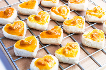 Heart shape cookies with cashew nut or Singapore Cookie on white background for valentines day element concept design.