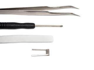 Vaping accessories and tools in a white background