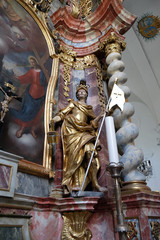 Fototapeta premium Saint Florian, statue on altar in cathedral of Assumption in Varazdin, Croatia