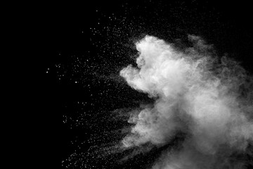 Explosion of white dust on black background. - 228714687